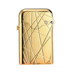 A gold Gen 3 Single Claw lighter featuring an abstract modern grid of asymmetric engraved lines on a brushed and polished brass body.