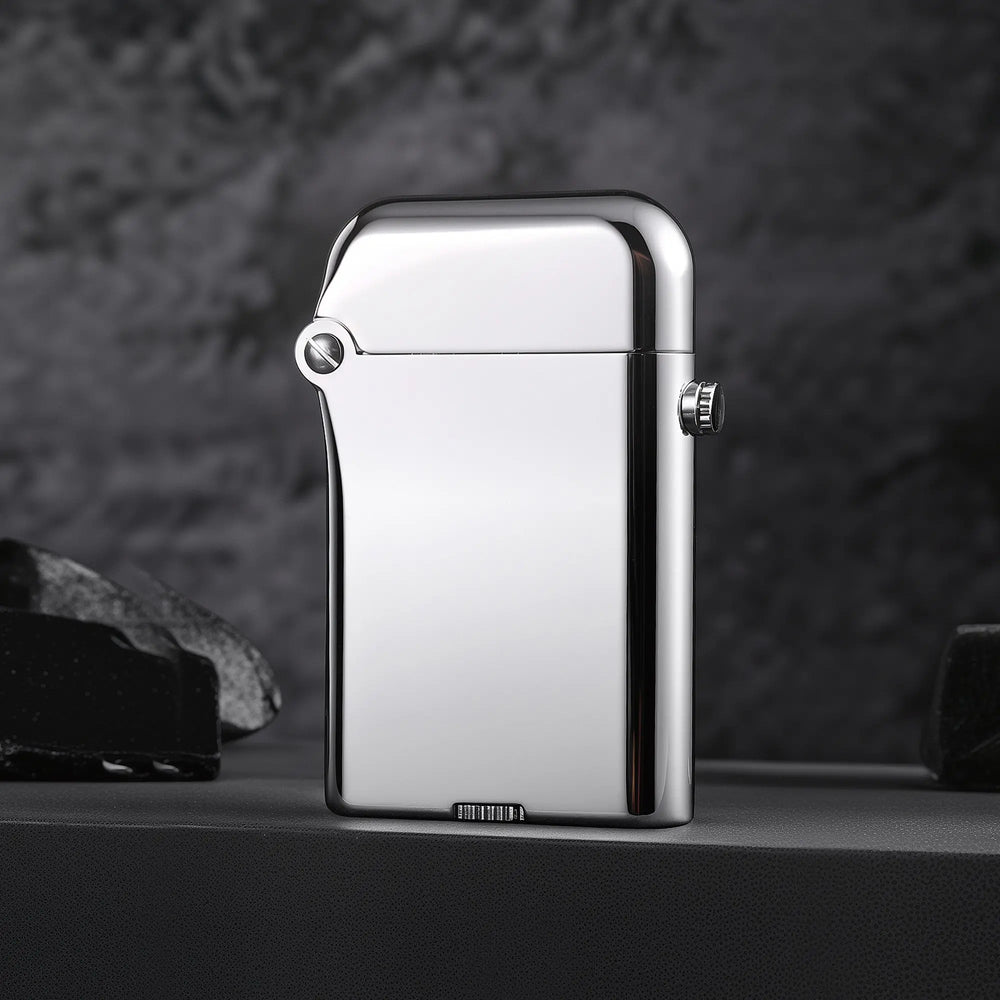 A Thorens Gen 3 Single Claw lighter featuring a polished silver glossy finish and heritage mechanical structure against a dark, textured background.
