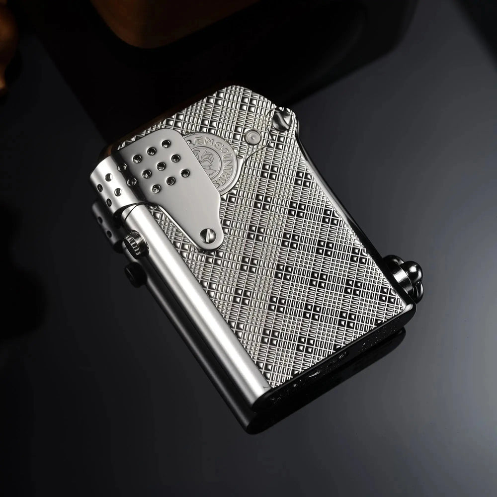 A Thorens Gen 5 Single Claw "STORM" lighter in silver, resting on a dark reflective surface to showcase the intricate Starry Mesh texture and the perforated wind guard.