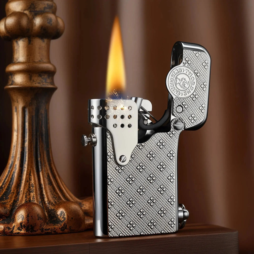 A Thorens Gen 5 Single Claw "STORM" lighter in silver with a Starry Mesh pattern, captured mid-ignition with a steady flame and mechanical sparks in a warm lifestyle setting.