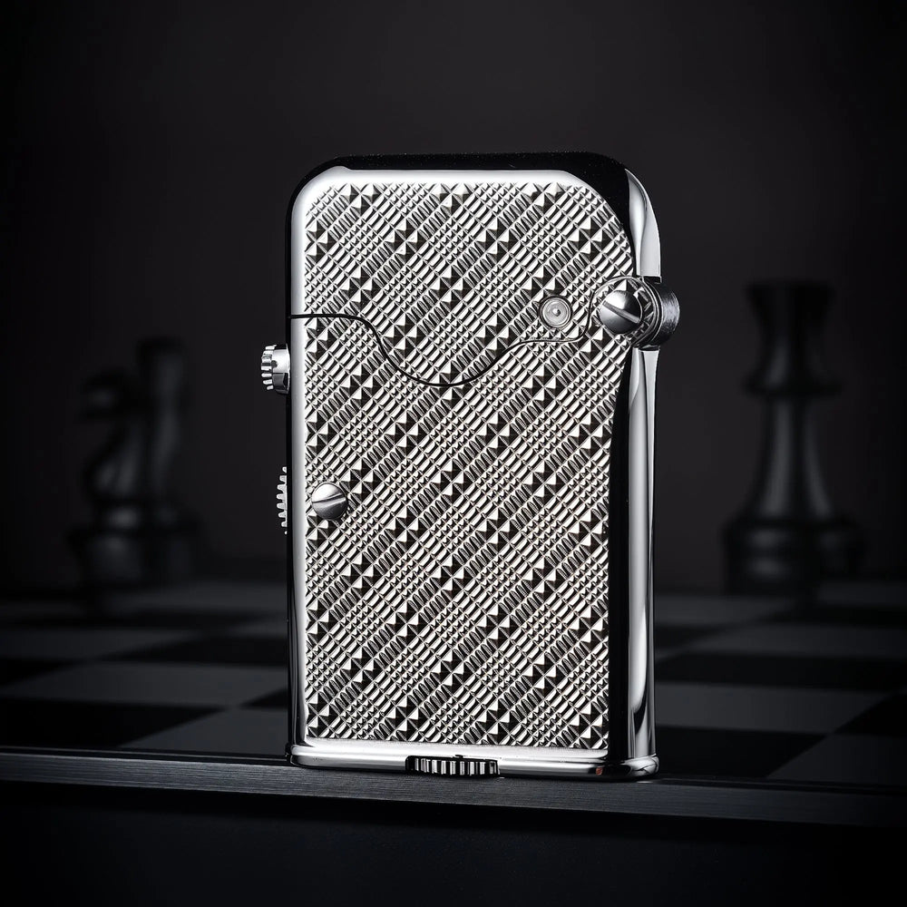 A Thorens Gen 7 Single Claw Teleflam lighter stands upright, showcasing its polished chrome finish and intricate plum pattern engraving.