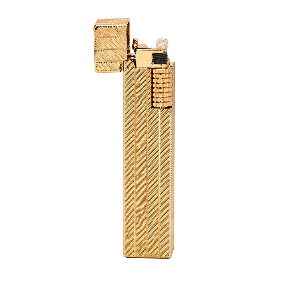Thorens rectangular lighter with gold diagonal pattern shown open, highlighting wick, flint wheel, side ignition wheel, and precise metal structure.