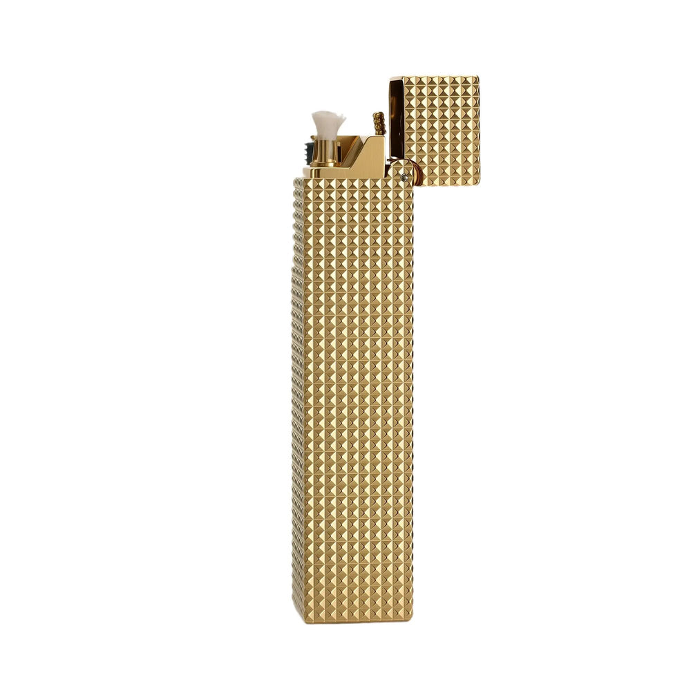 Front view of an open gold small square textured Thorens side-slip rectangular lighter with visible wick and ignition structure against a light background