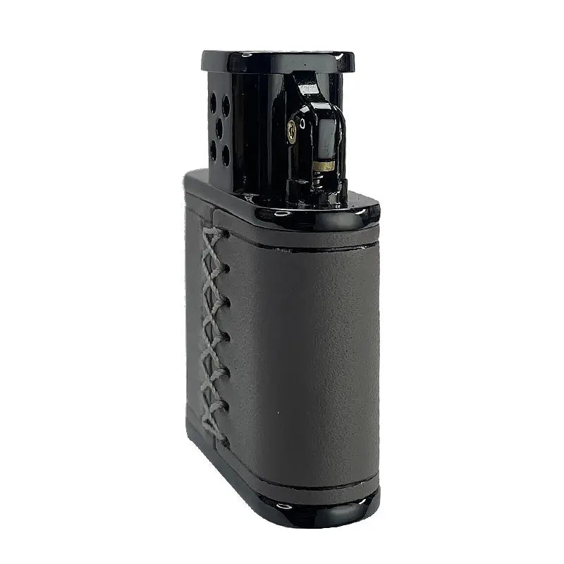 A side view of a gray Thorens lighter featuring a hand-stitched cowhide leather wrap and a black polished mechanical ignition head.