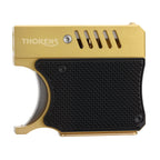 A unique Thorens lighter shaped like a pistol grip, featuring a brushed gold-toned chassis, a black textured rubberized grip panel, and slotted heat vents.