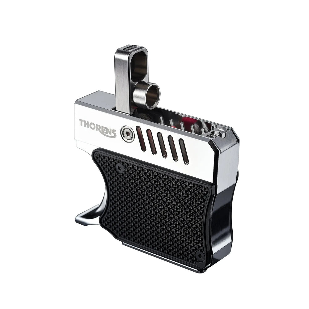 A studio shot of the Thorens Gun Lighter with its mechanical hood flipped open. The image features a clean white background, emphasizing the brushed silver finish and the contrasting black diamond-textured grip.