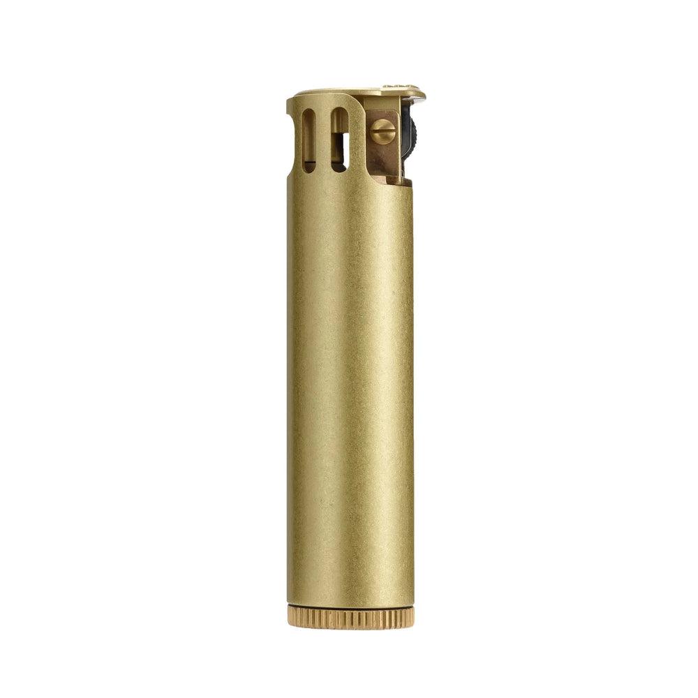 Vertical standing Ignis Tower lighter in a brushed brass finish, featuring a slotted windguard and a precision knurled fuel cap at the base.