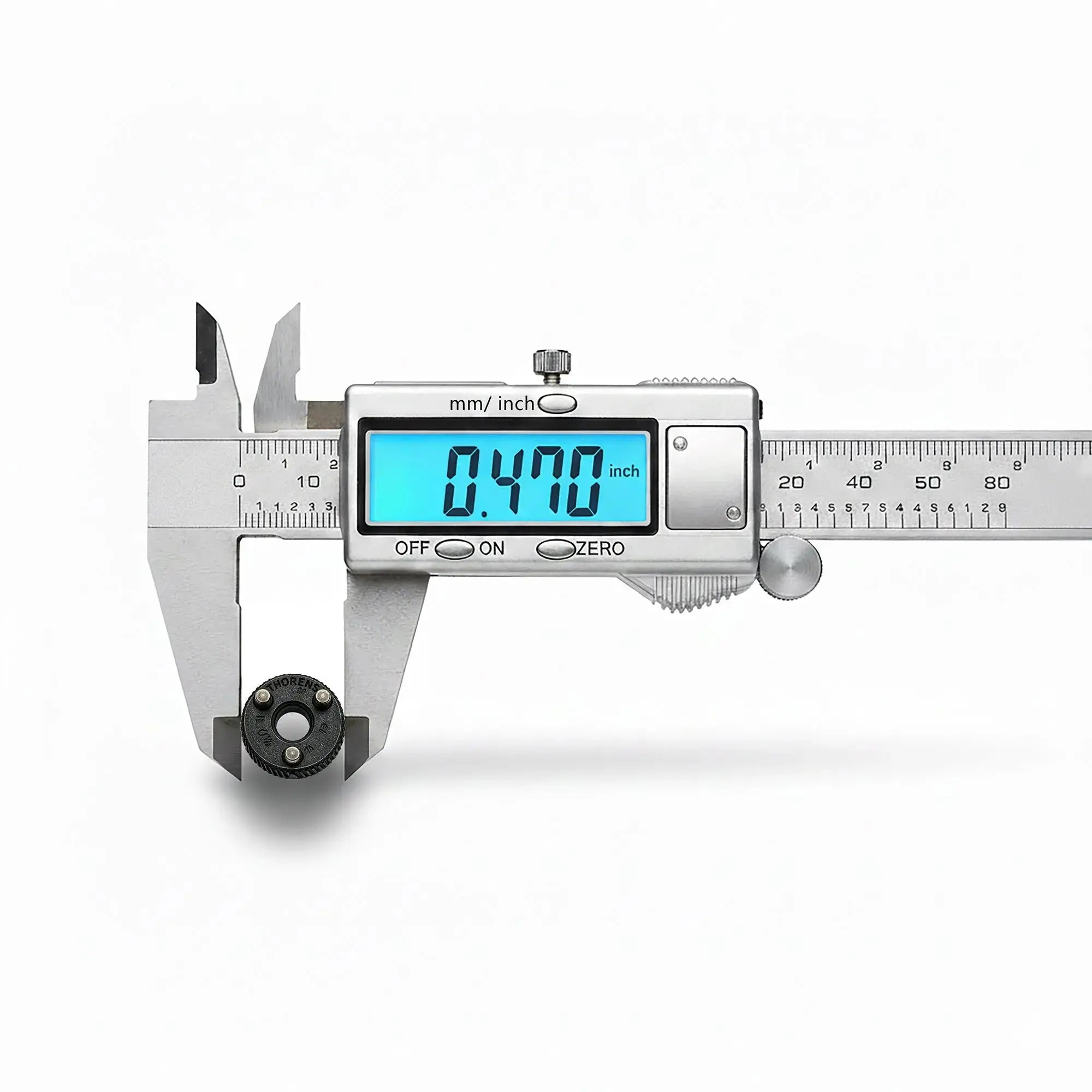 A digital caliper measuring the outer diameter of a Thorens flint wheel accessory, showing a precise reading of 0.470 inches to confirm compatibility with standard mechanical claw lighter housings.