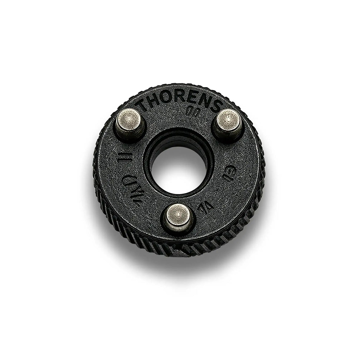 Close-up of a matte black Thorens flint wheel, highlighting the textured industrial finish and the precision mounting pins that ensure seamless engagement with the lighter's internal claw mechanism.