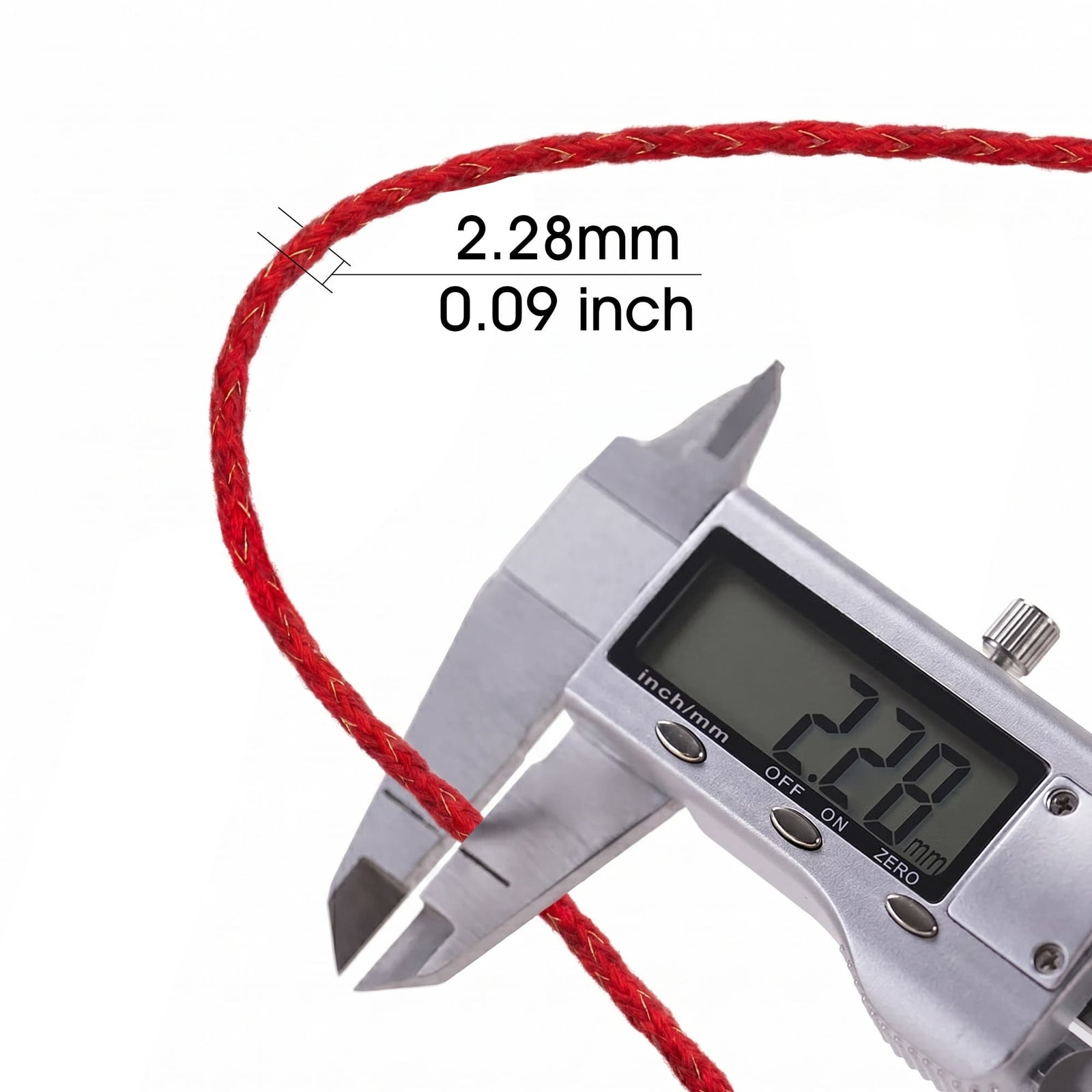 Close-up of Thorens lighter wick with copper wire measured by a digital caliper, showing a diameter of 2.28 mm (0.09 inch) on braided red wick.