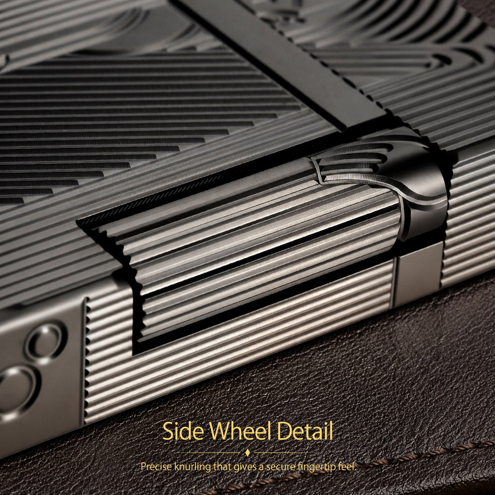 A front-facing view of the black Thorens Mermaid lighter, showcasing the deep-etched Art Deco mermaid motif and unique scalloped top against a dark, moody background.