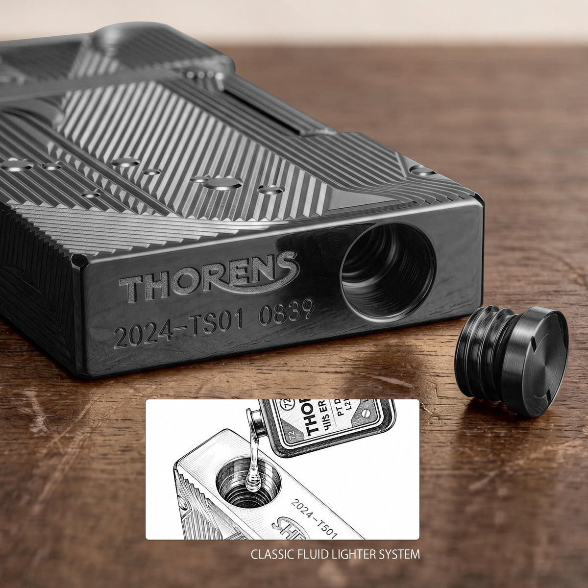 A premium black Thorens Mermaid lighter presented in its signature red gift box, accompanied by a 5-pack of genuine flints, replacement wicks, and a user manual.