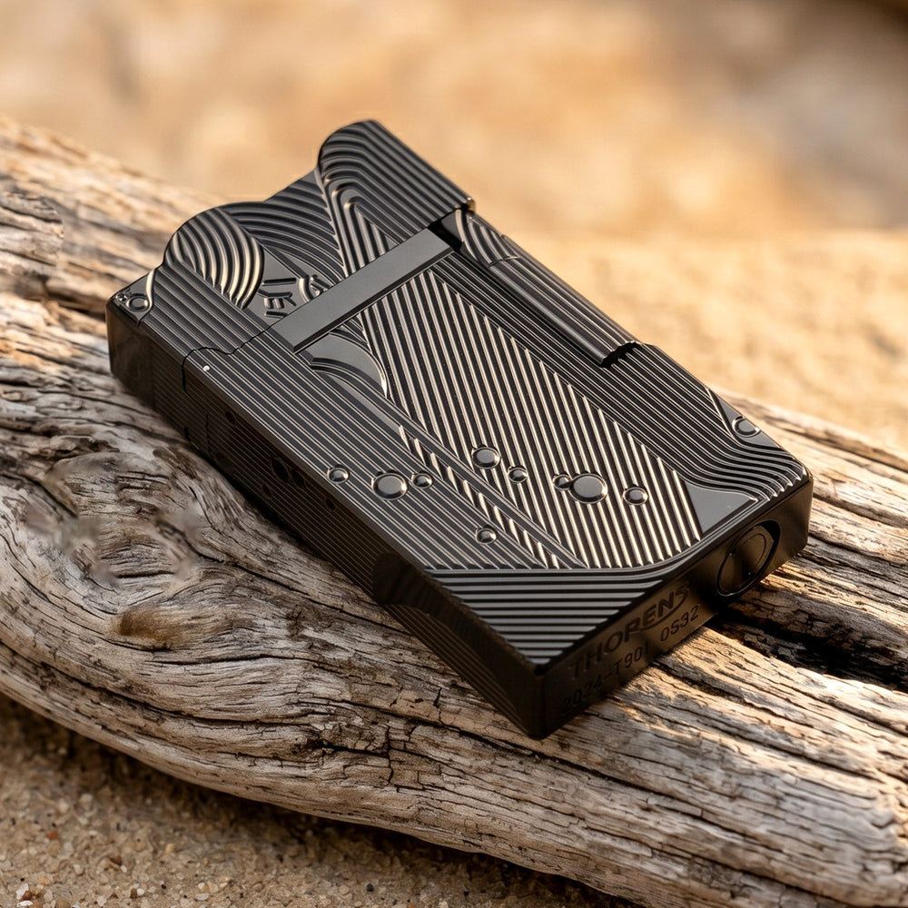 An ignited black Thorens Mermaid lighter showcasing a vibrant flame and active sparks. The deep black finish and Art Deco engravings are highlighted against a dark chessboard background.