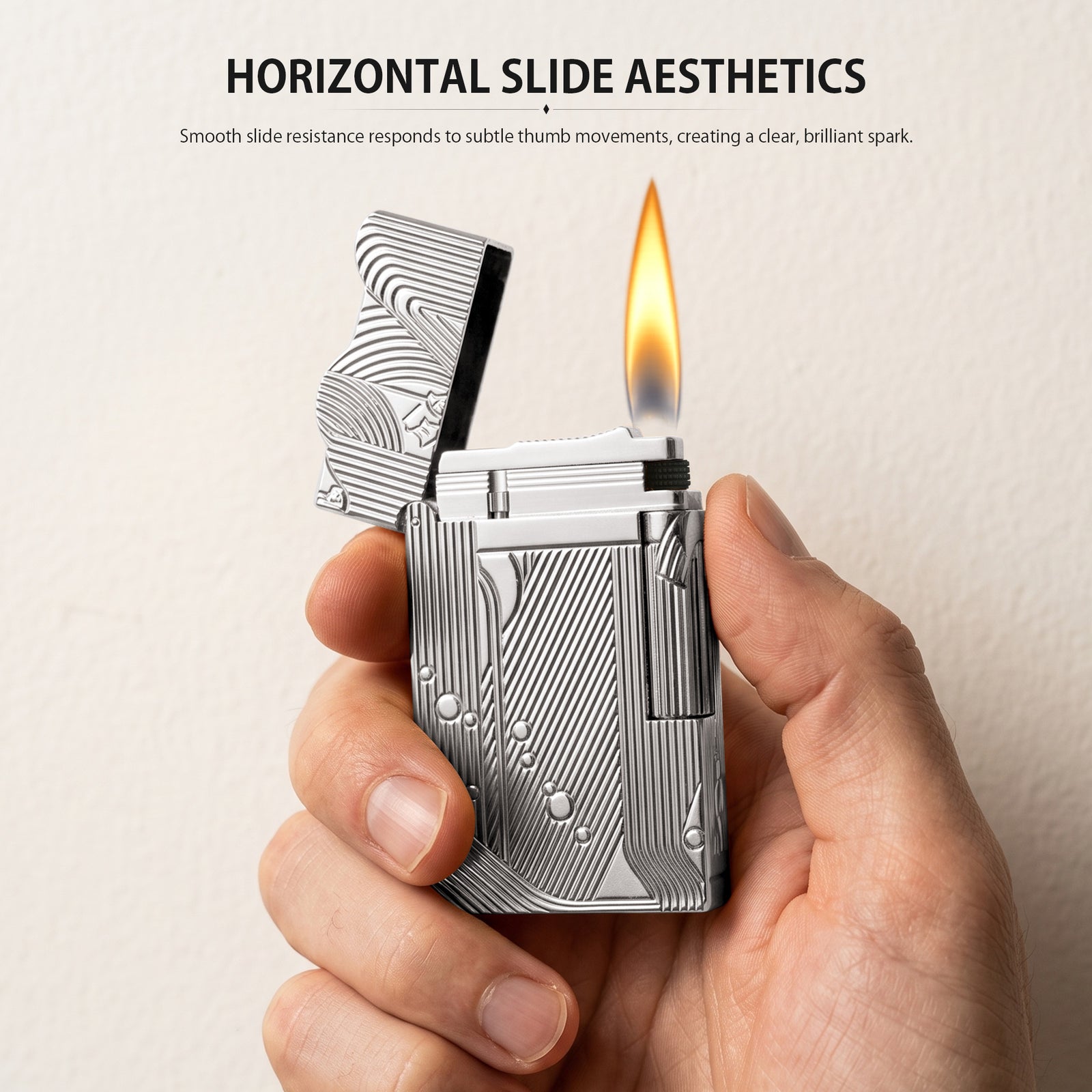 An open silver Thorens Mermaid lighter against a clean white background, showcasing the brilliant chrome-like finish on the internal ignition deck and the continuity of the wave engravings under the lid.