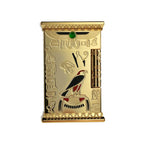 A gold-toned Pharaoh's Light lighter featuring embossed Egyptian hieroglyphics, a central falcon relief, and a green gemstone inlay against a white background.