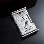 Polished silver Thorens lighter resting on a reflective surface, featuring detailed Egyptian falcon engravings, a blue gem, and hieroglyphs.