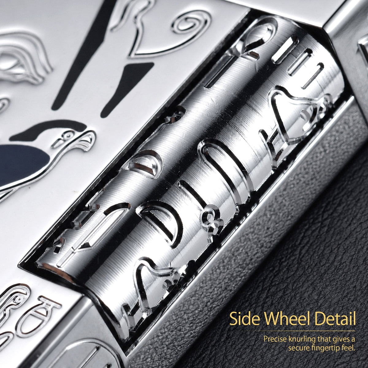 Open-lid silver Thorens lighter with an antique chrome finish, featuring an engraved Horus falcon, Egyptian hieroglyphs, and a blue gemstone.