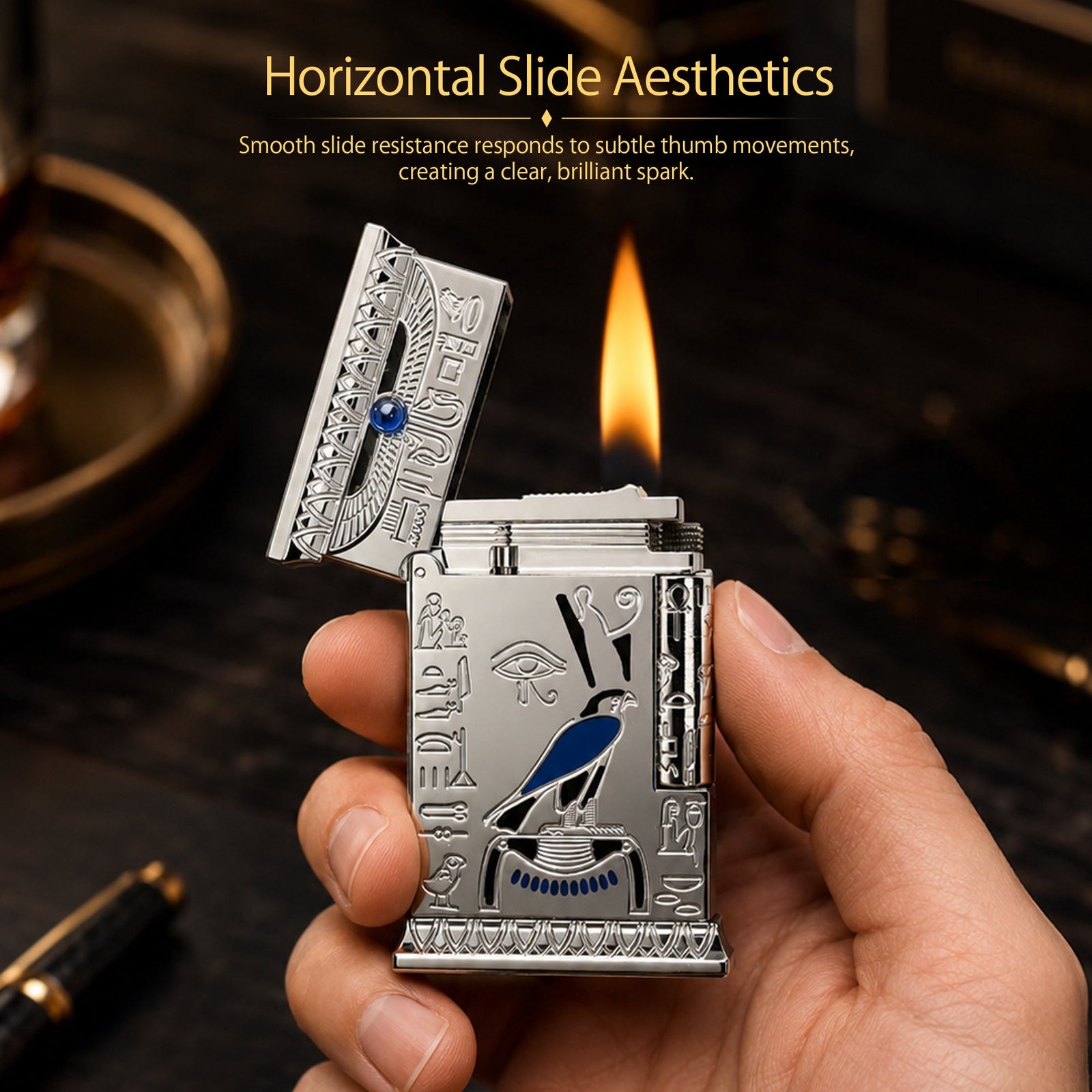 Side profile of the Pharaoh's Light Silver lighter with the lid open, showcasing the high-polish chrome finish and intricate Egyptian falcon engravings.