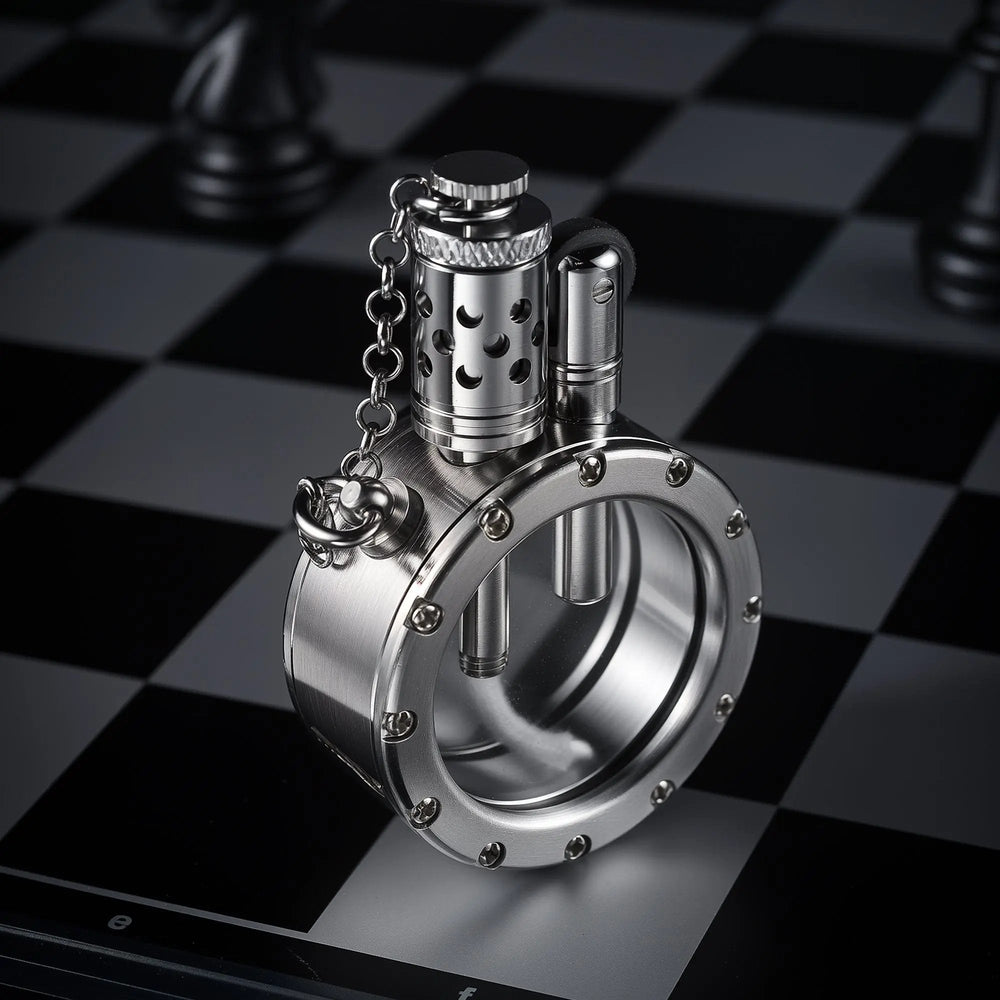 A silver-finished Round Pocket Watch Lighter with a crystal-studded rim and chain-linked cap, showcasing its mechanical chimney on a chessboard.