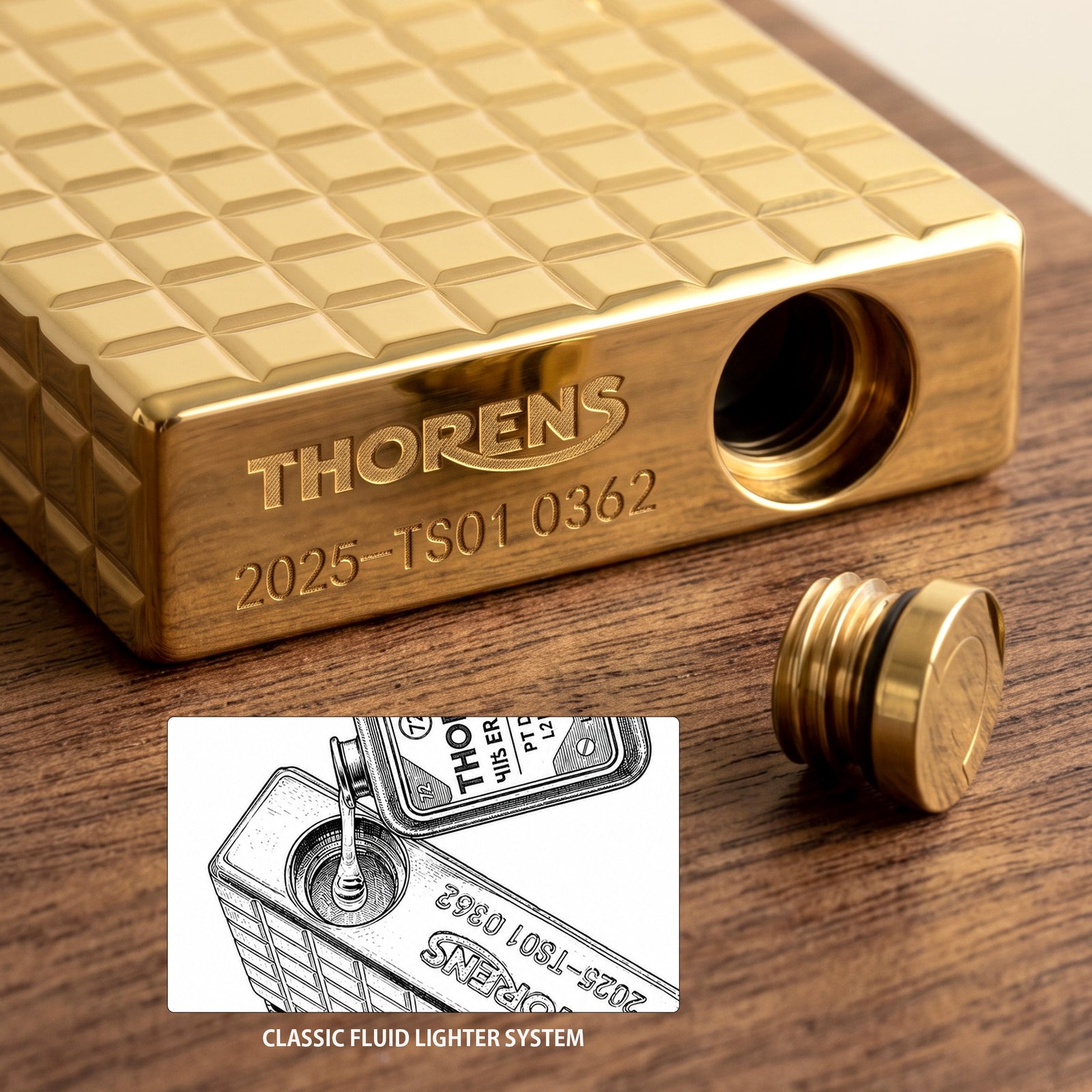 The back of a gold Thorens side slip lighter, showcasing the seamless auric block pattern and high-polish finish across the brass body.