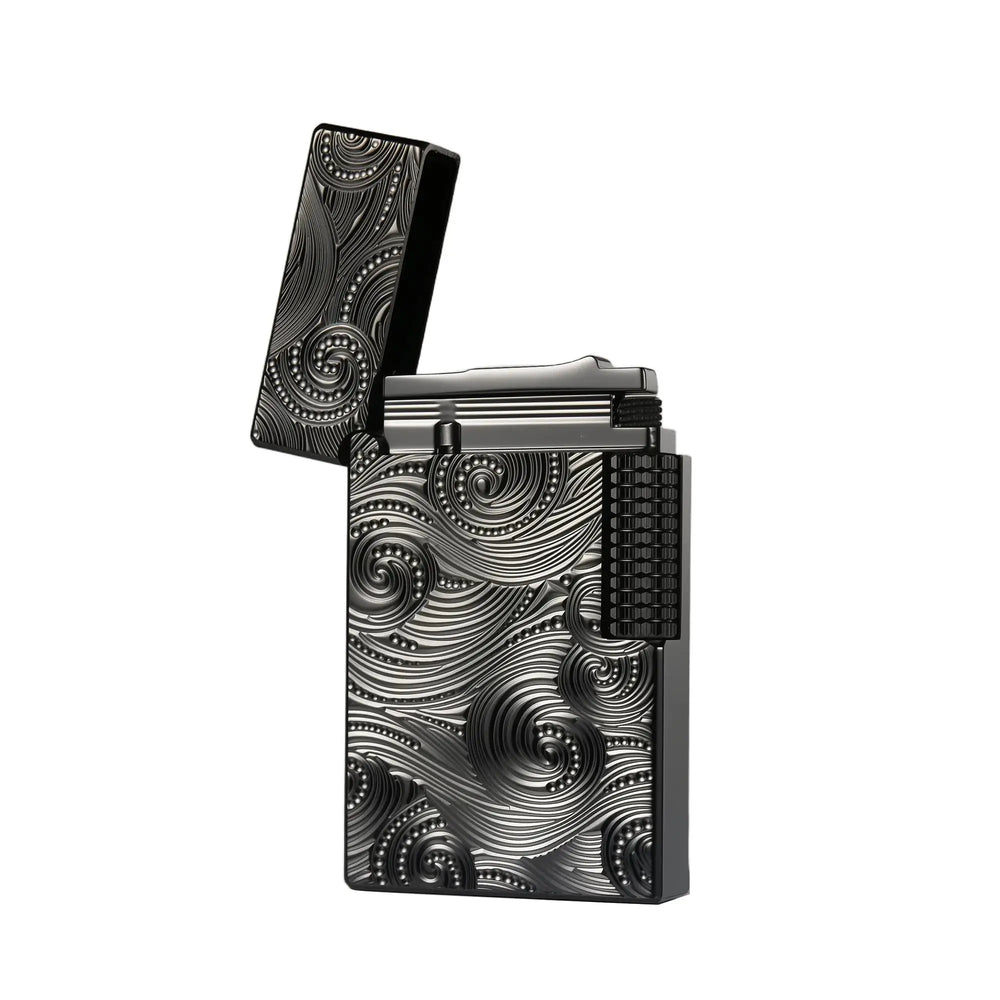Front view of a Thorens Side Slip Crisp Sound lighter in black with vortex engraved detailing, open lid, side-slip ignition wheel, and sculpted metal texture against a clean background