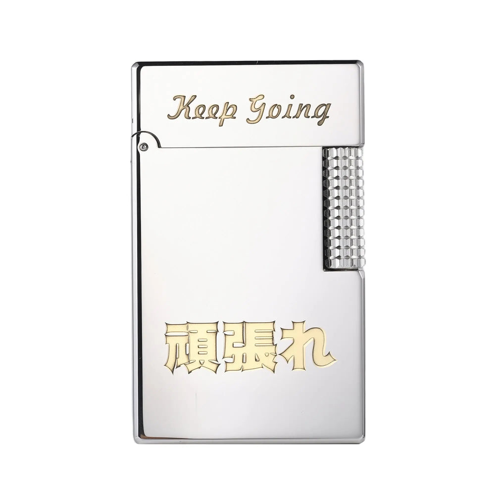 A polished silver Side Slip lighter featuring the engraved English phrase "Keep Going" on the lid and the Japanese kanji "頑張れ" (Ganbare) on the body in a gold-tone inlay.