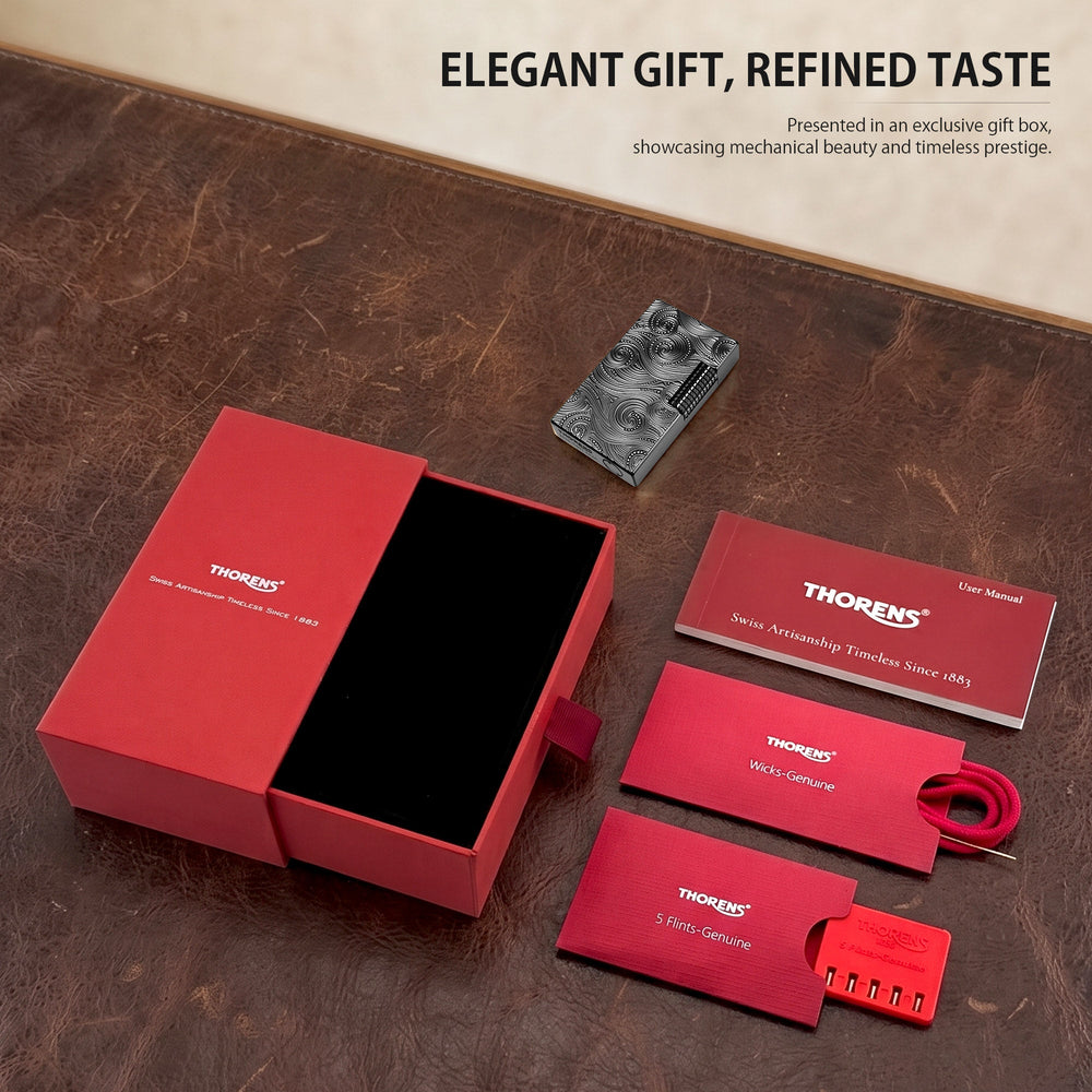 A comprehensive product list view of the Thorens Side Slip lighter in black Vortex engraved finish, including a premium red branded gift box, a user manual, a replacement wick, and a 5-piece flint pack, highlighting a complete collectible set for heritage lighter enthusiasts.