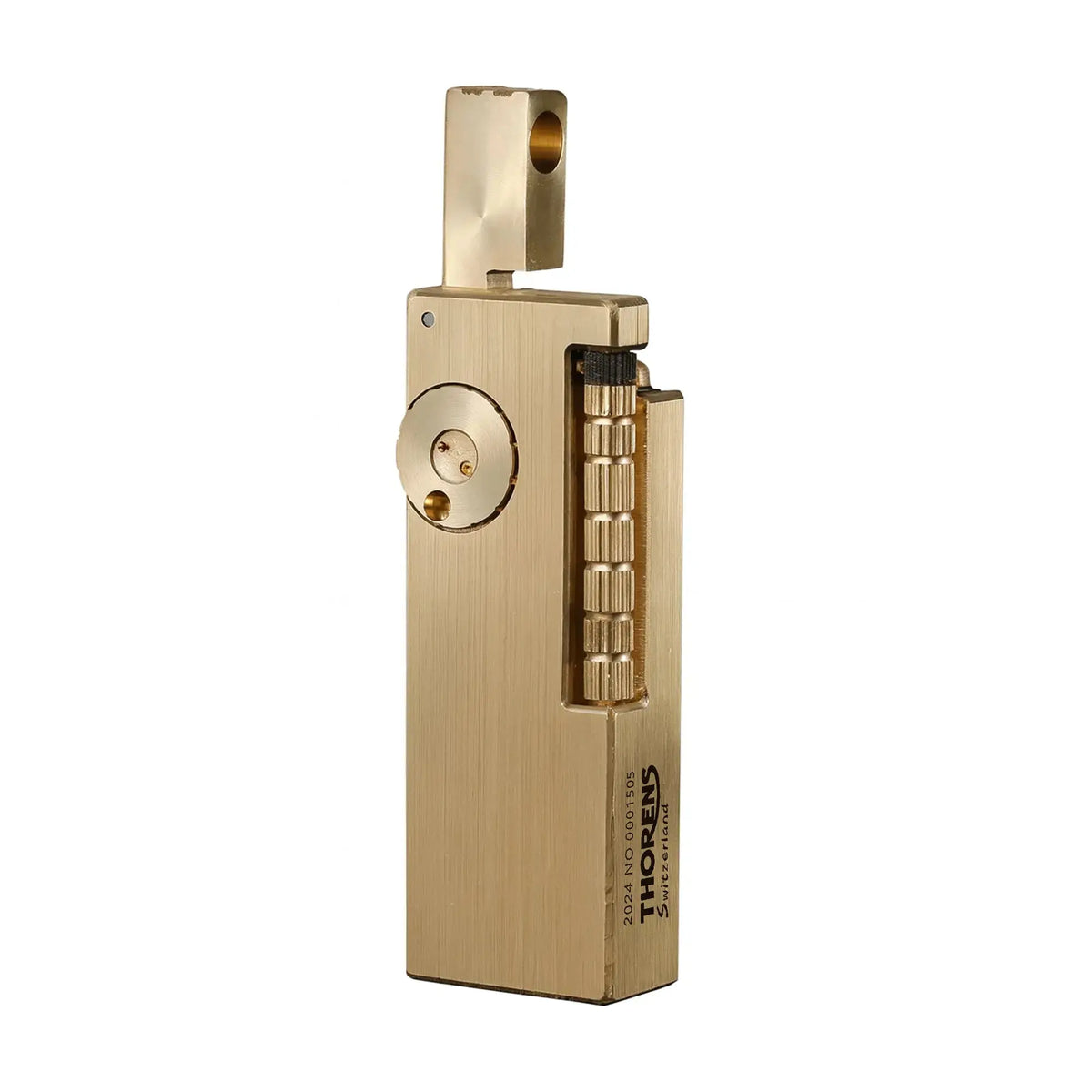 A premium Thorens Side Slip lighter featuring a glossy brushed brass finish and mechanical "fish intestine" textured flint wheel, showcasing Swiss heritage craftsmanship and refined EDC aesthetics.