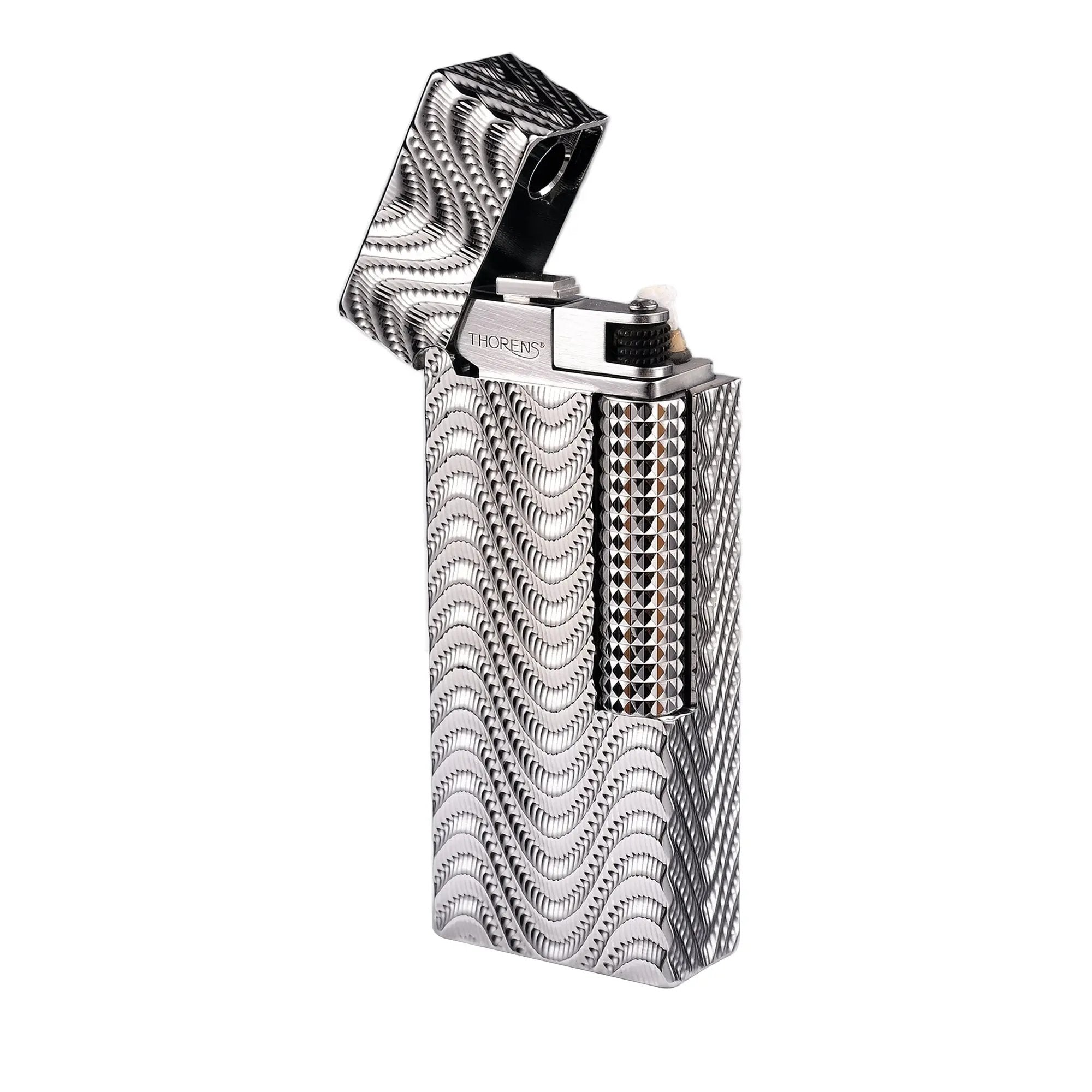 An open Argent Mirage narrow lighter against a white background, featuring a high-density wavy "mirage" texture across its silver body, a polished internal chimney with the Thorens logo, and a diamond-cut ignition roller.