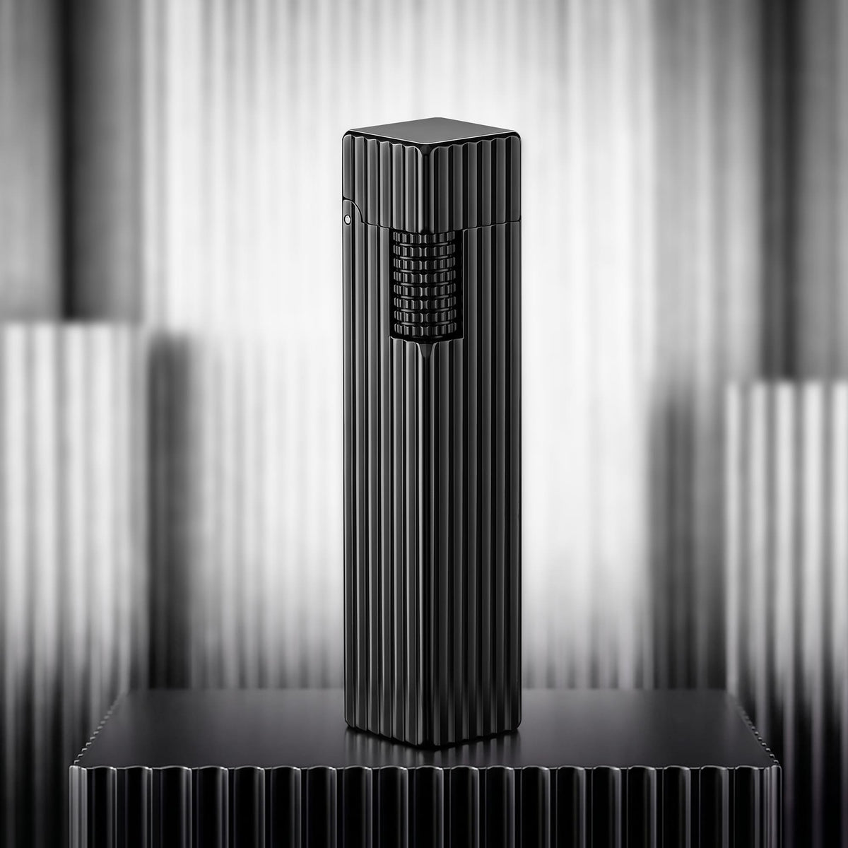 Thorens Side Slip rectangular lighter in black pinstripe finish standing upright, highlighting textured ignition wheel and vertically grooved metal body.
