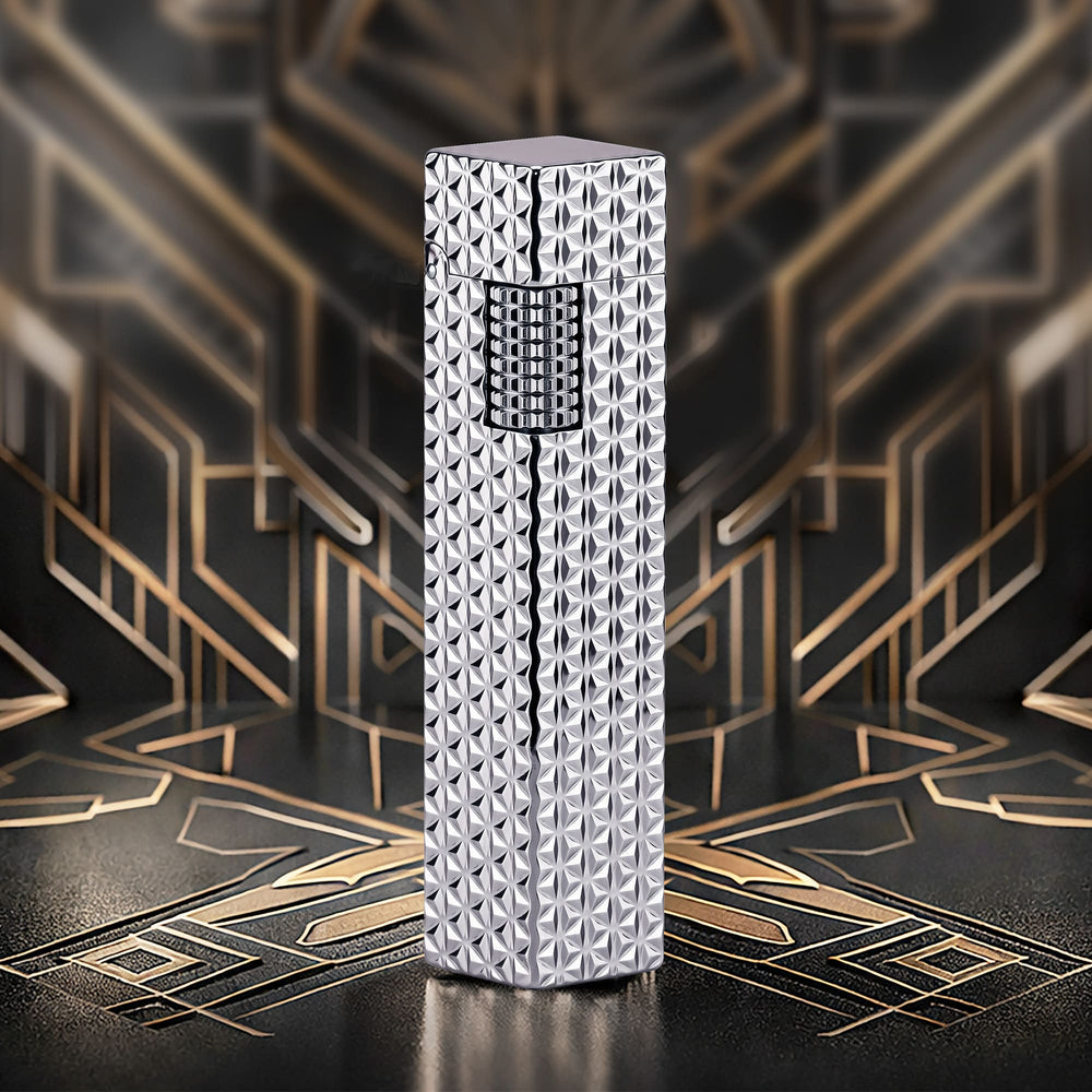 Thorens Side Slip rectangular lighter in silver starburst pattern standing upright, highlighting geometric engraved surface and integrated ignition wheel.