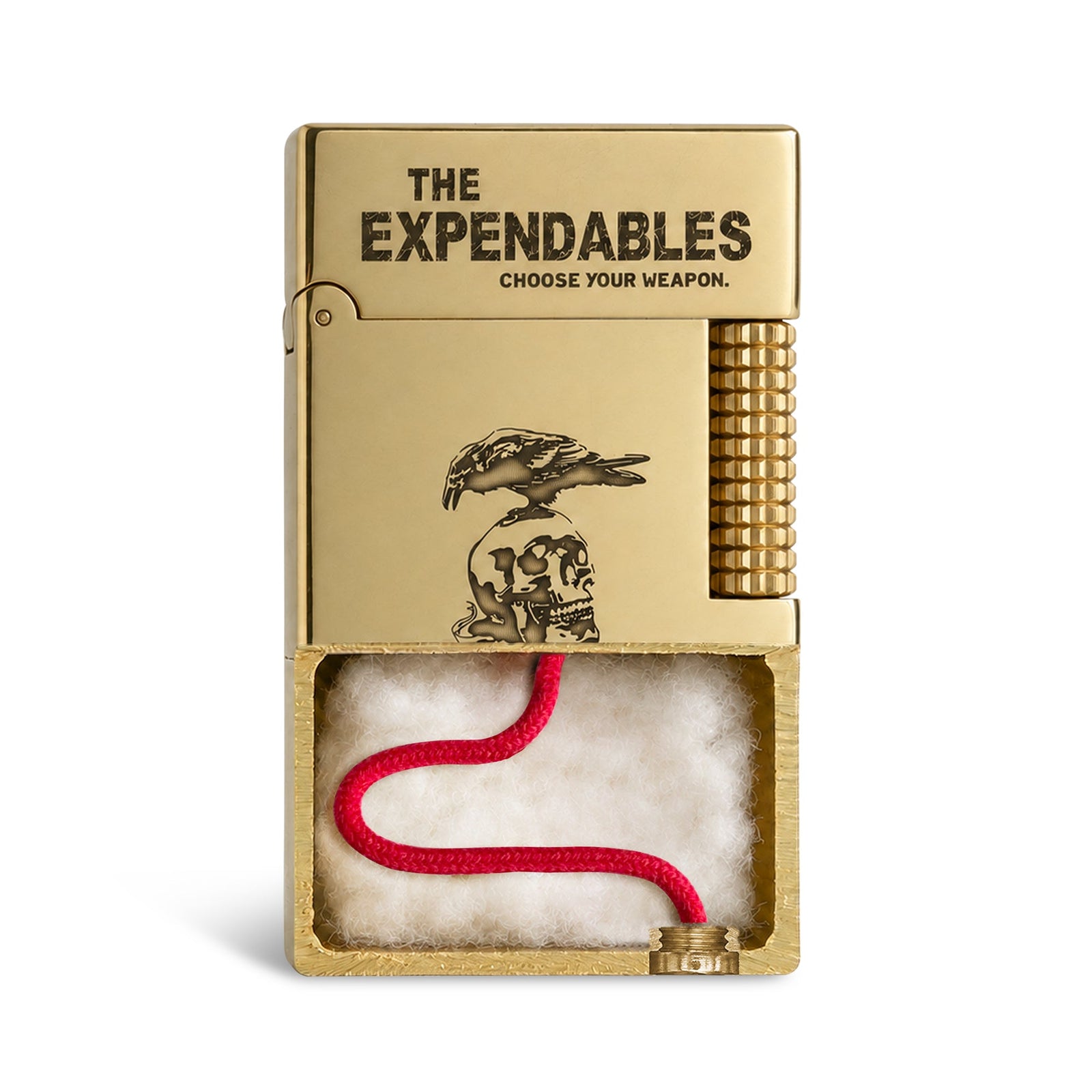 An open gold Side Slip lighter featuring The Expendables etching and skull insignia, shown in a high-resolution studio shot on a white background.