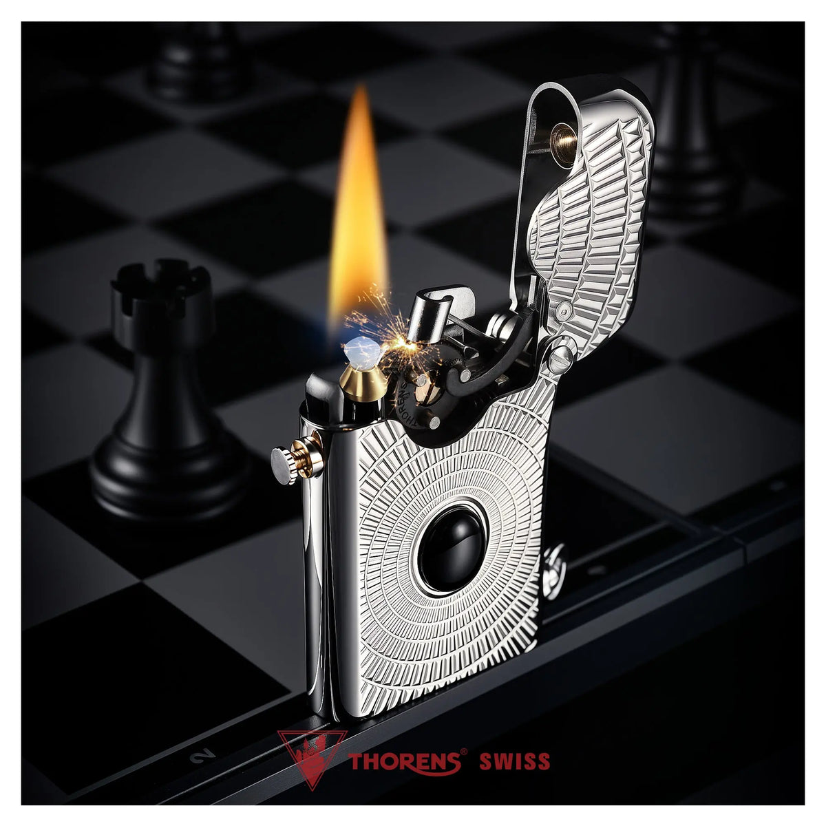 A close-up lifestyle shot of the intricate Thorens Single Claw Gen 1 Eye of Diamond lighter ignited with a flame, set against a dark chessboard background for refined EDC aesthetic.