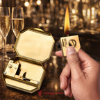 Thorens Steampunk Matchbox Twin Torque lighter with open case and removable fuel reservoir held in hand, showing lit wick and brass construction.