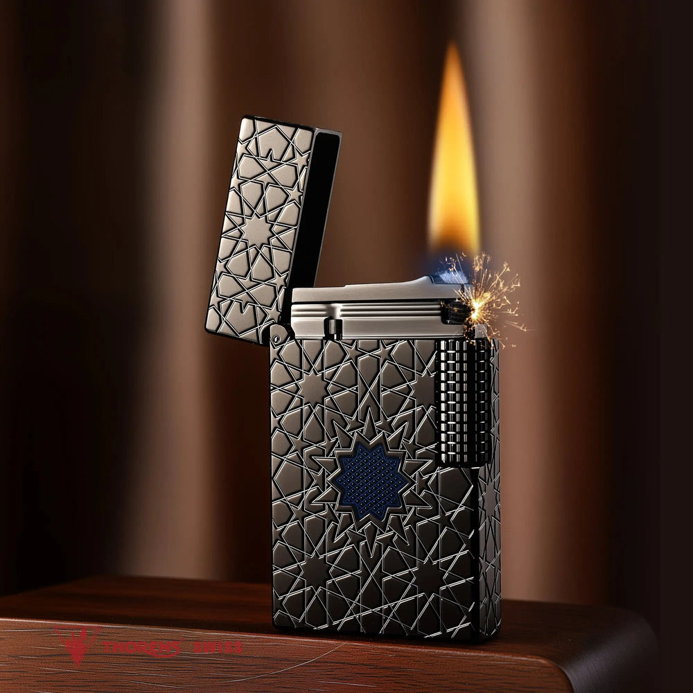 An ignited Thorens Stellar Mesh Black lighter on a wooden stand, highlighting the mechanical flint spark and the contrast of the blue mesh inlay against the black geometric star engraving.