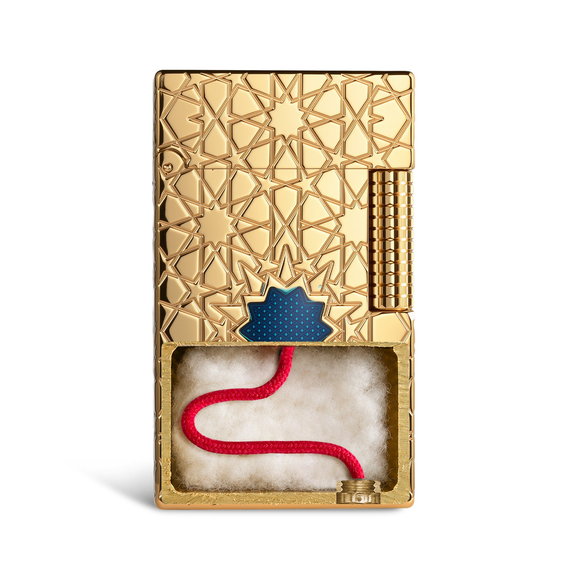 A top-down view of the Thorens Stellar Mesh Gold lighter on a dark reflective surface, showcasing the precise geometric star engraving and blue mesh inlay.