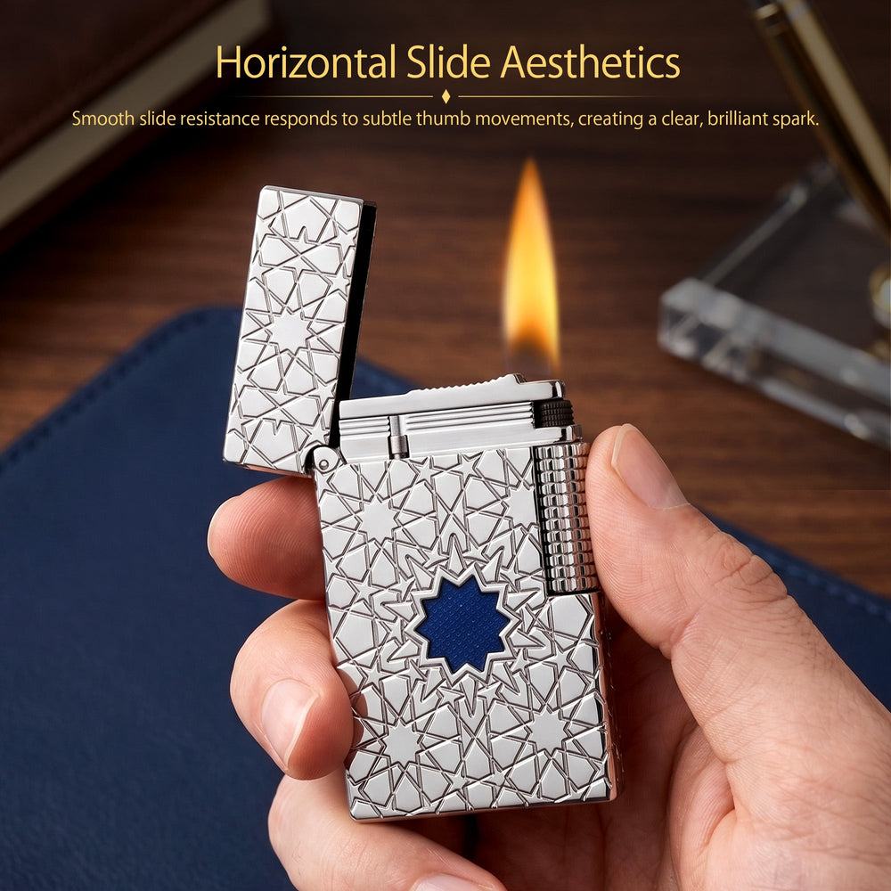 A Thorens Stellar Mesh Silver lighter with an open flip-top, featuring deep-etched geometric star patterns, a vibrant blue mesh center, and precision silver-toned mechanics.