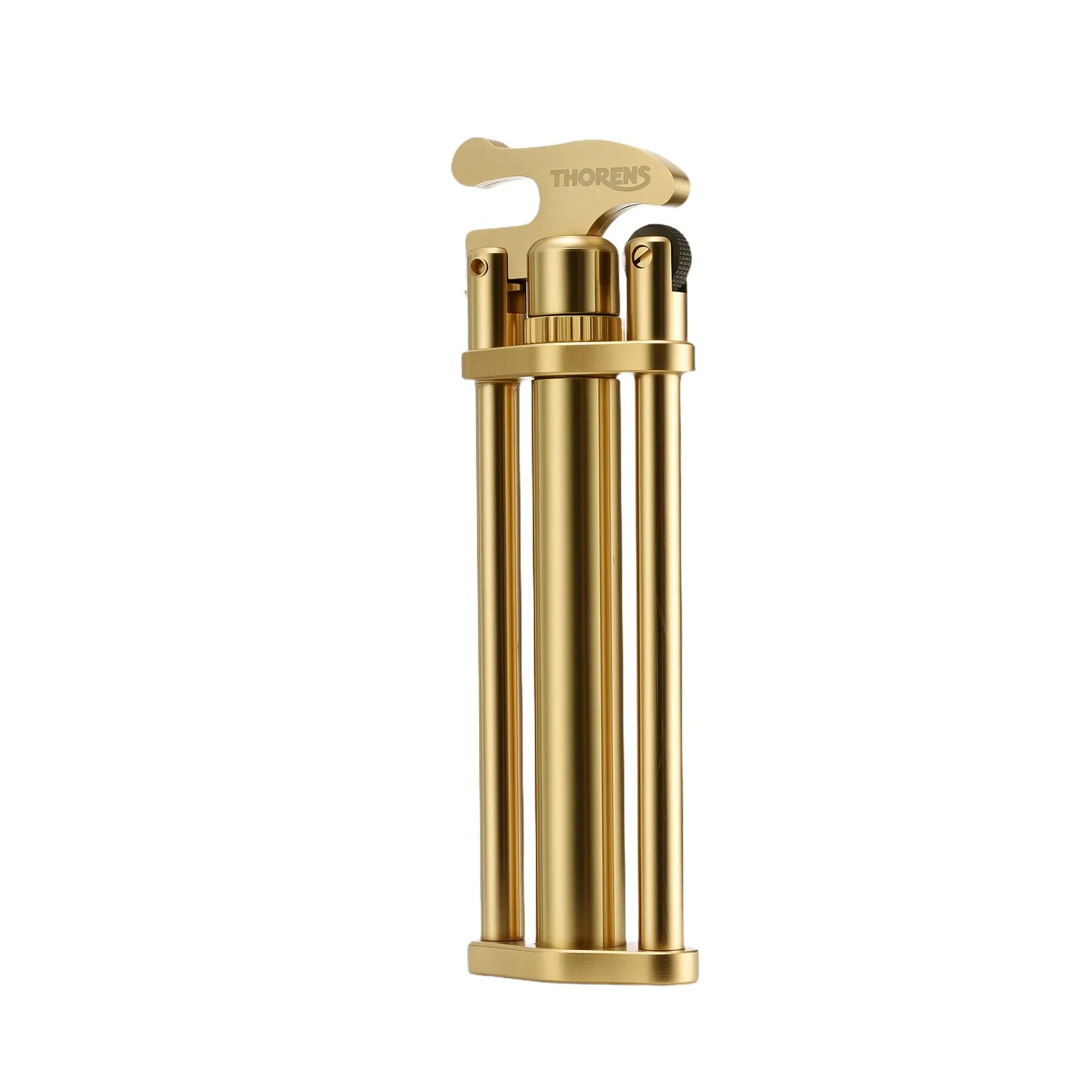 A unique three-section stick lighter with a tripod-style brass body, featuring a top-mounted mechanical ignition lever engraved with the Thorens logo.