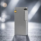 Thorens Slim Cube Silver Mesh lighter standing upright on a softly lit surface, featuring a slim rectangular form, silver mesh texture, polished silver-tone body, and gold-tone accent detail