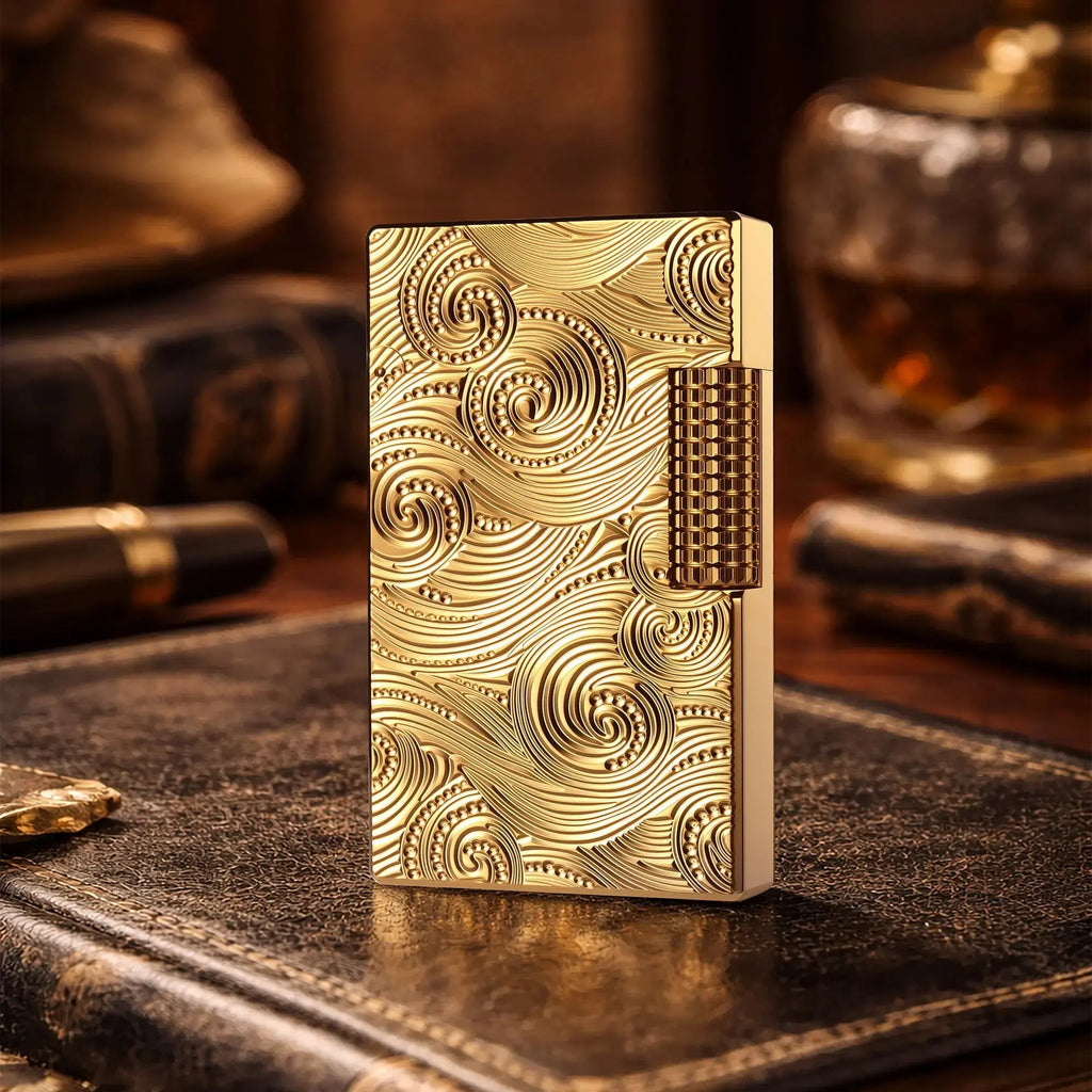 A premium Thorens gold lighter featuring deep vortex engravings and a textured side-slip roller, standing upright on a leather surface in a refined study setting.