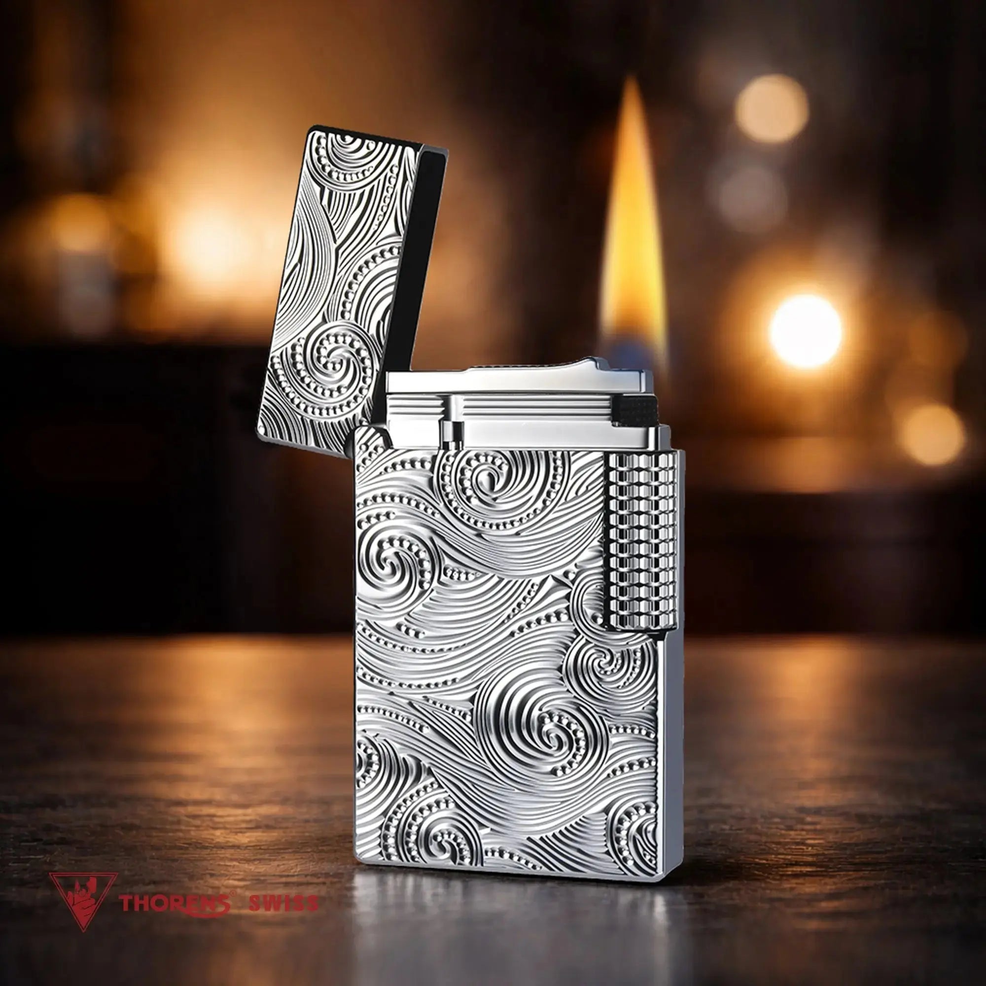 A Thorens silver vortex lighter with the lid open and a steady flame, showcasing the precision engineering that produces its signature crisp sound.