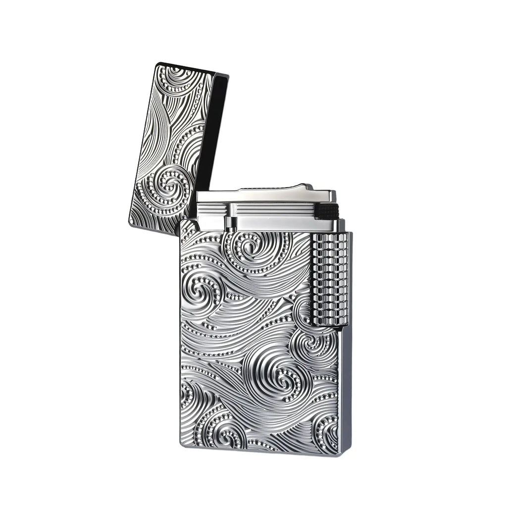 A premium Thorens silver lighter with an open lid, showcasing the intricate vortex engraving and the signature side-slip mechanical components against a white background.