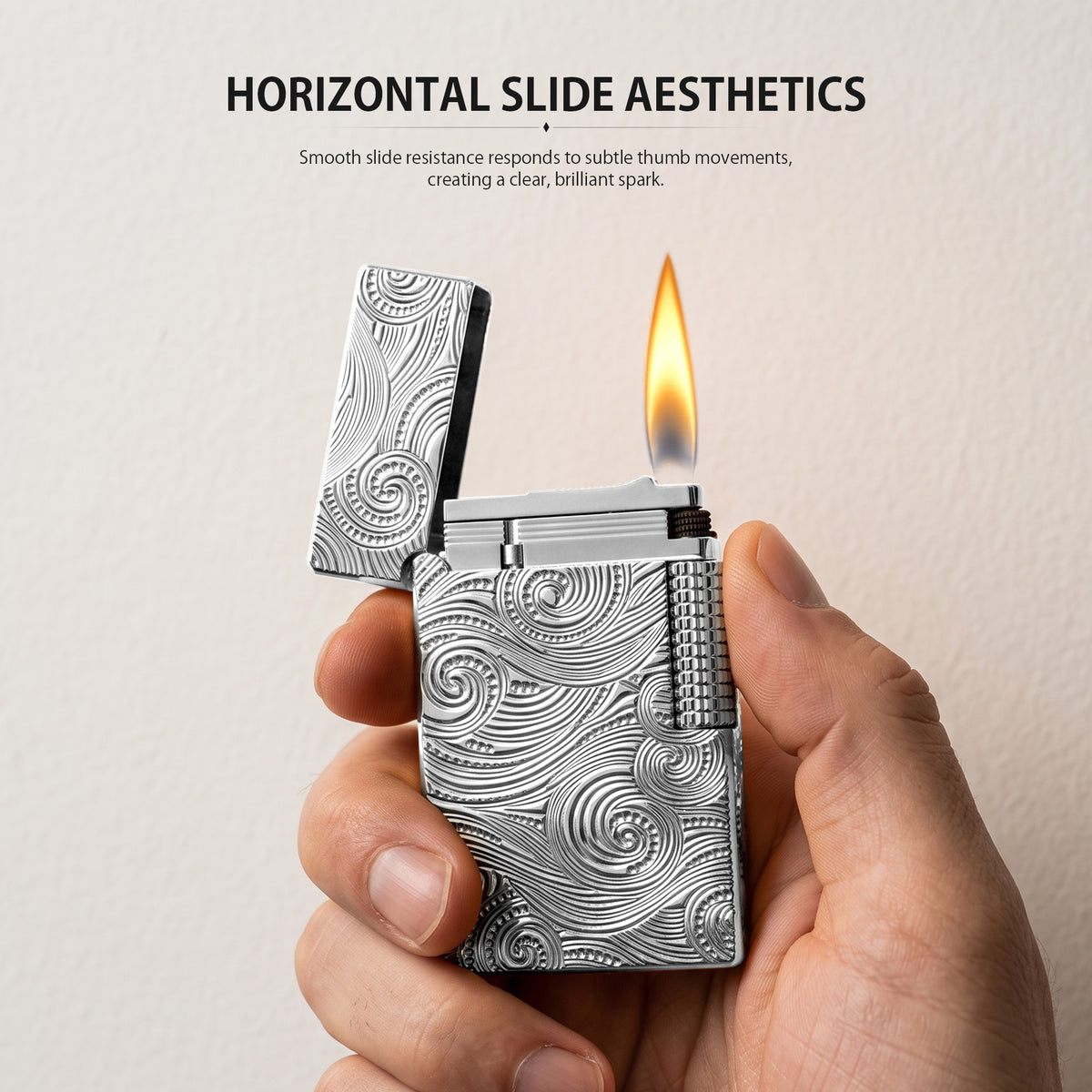 A premium Thorens silver lighter with an open lid, showcasing the intricate vortex engraving and the signature side-slip mechanical components against a white background.